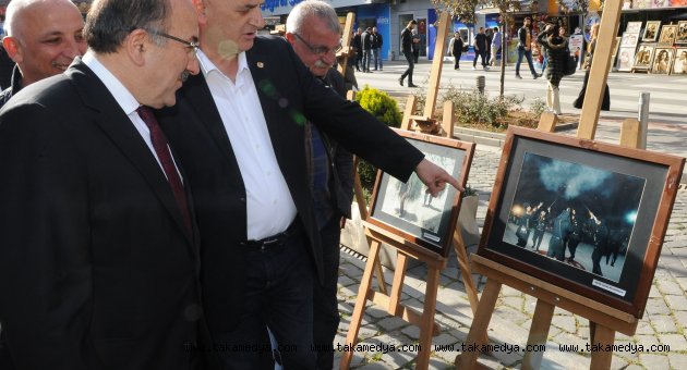Gümrükçüoğlu, merhum gazeteci Kayacık’ın eserlerinden oluşan fotoğraf sergisini gezdi