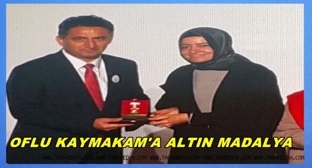 KAYMAKAM SUAT DERVİŞOĞLU'NA ALTIN MADALYA