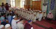 Kur’an hizmetin hizmetkârı olmaya amadeyiz